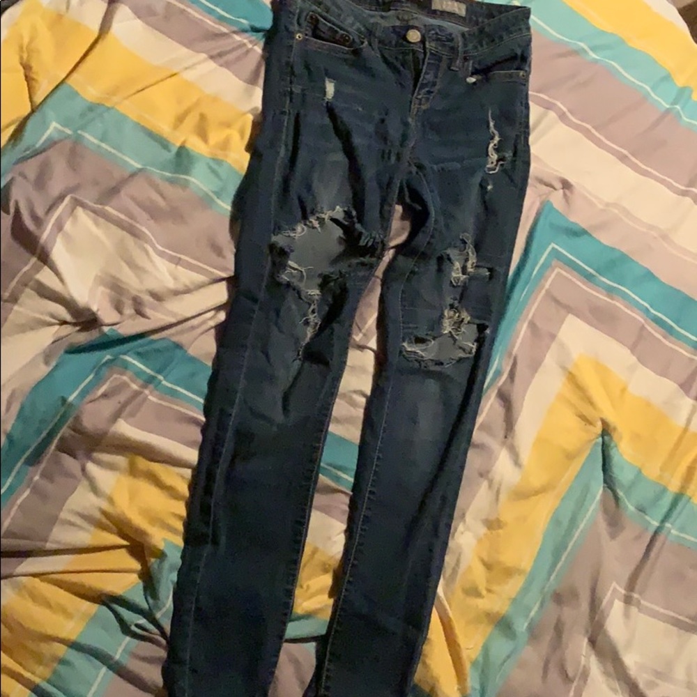 Ripped blue jeans